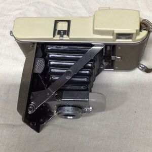 Polaroid Camera in Cream and Silver with Black Bellows